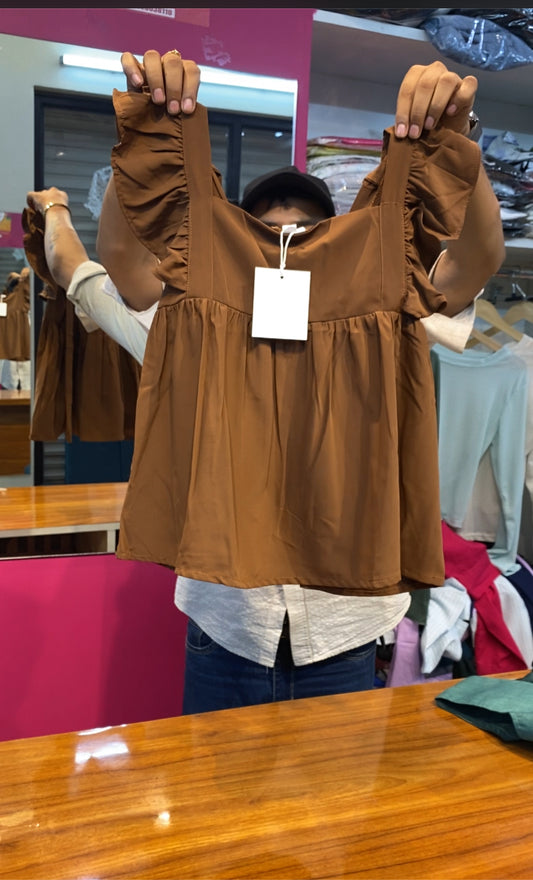 SLEEVELESS IMPORTED TOP